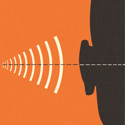 An illustration of sound waves emitted from the left edge heading toward the human ear and head on the right